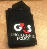 Photo of a G4S logo on a Lincolnshire Police item of security clothing